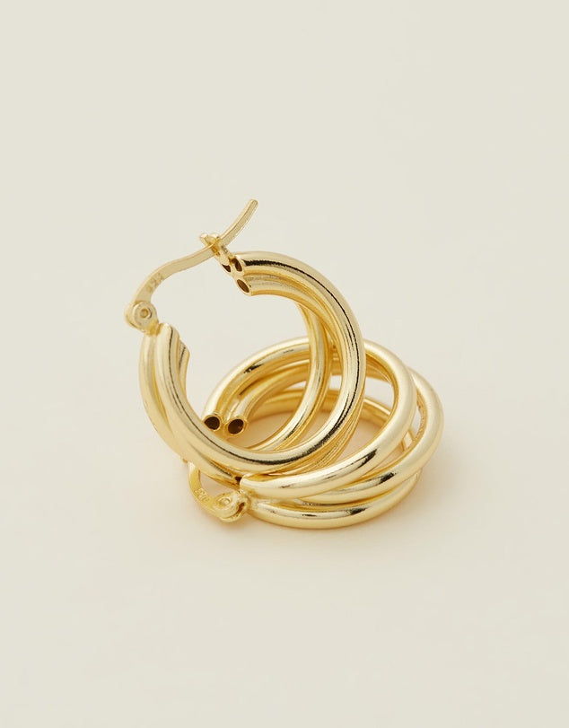 London Hoops - Gold earrings stacked together flat lay