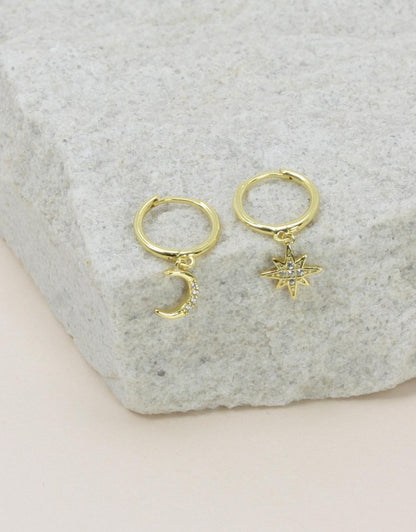 Night Sky Huggies - Gold flat lay 