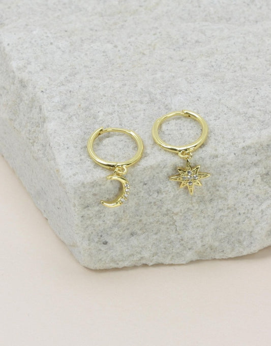 Night Sky Huggies - Gold flat lay 