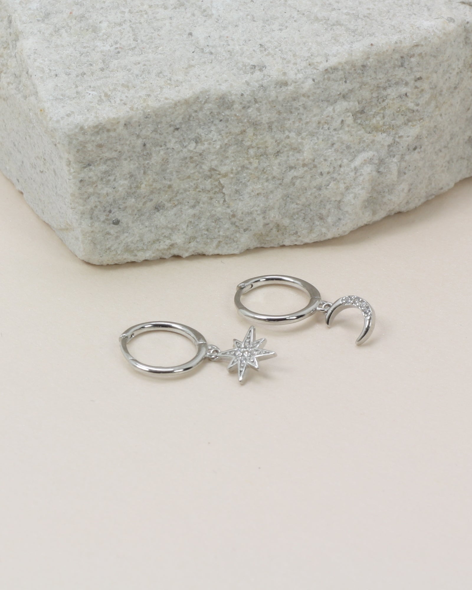 Night Sky Huggies - Silver flat lay close up