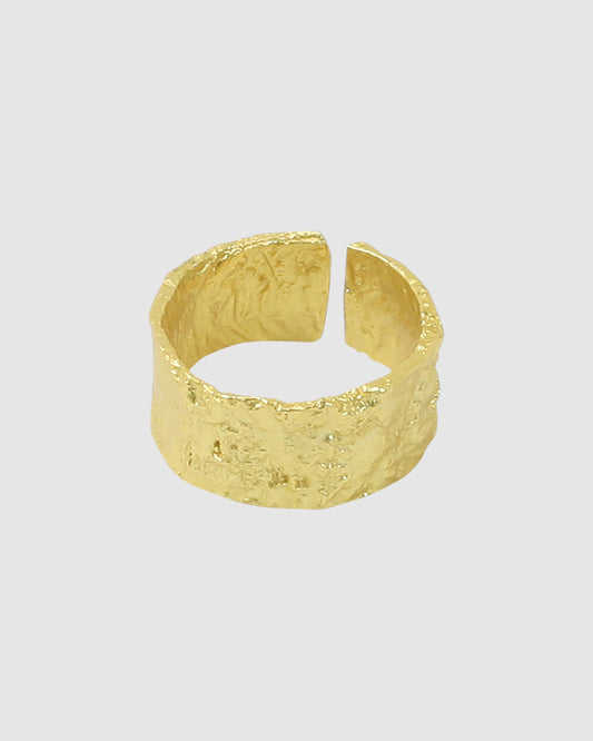 Noah Textured  - Gold-plated, textured cuff ring with foiling details on a white background.