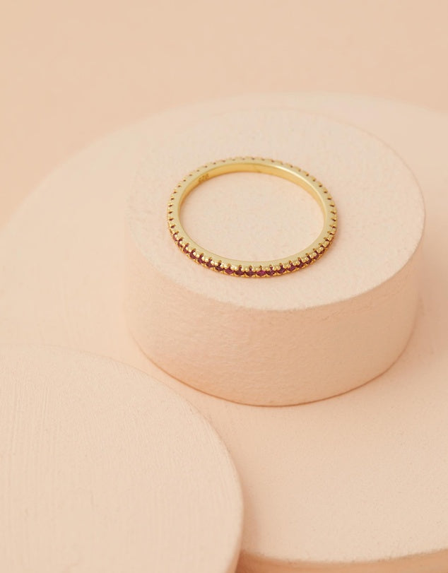 Rose Quartz Stacking Ring angled view flat lay on pink background